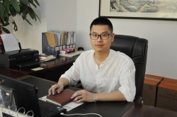 浮躁中的坚守——访明伟鞋服总经理洪钦铭